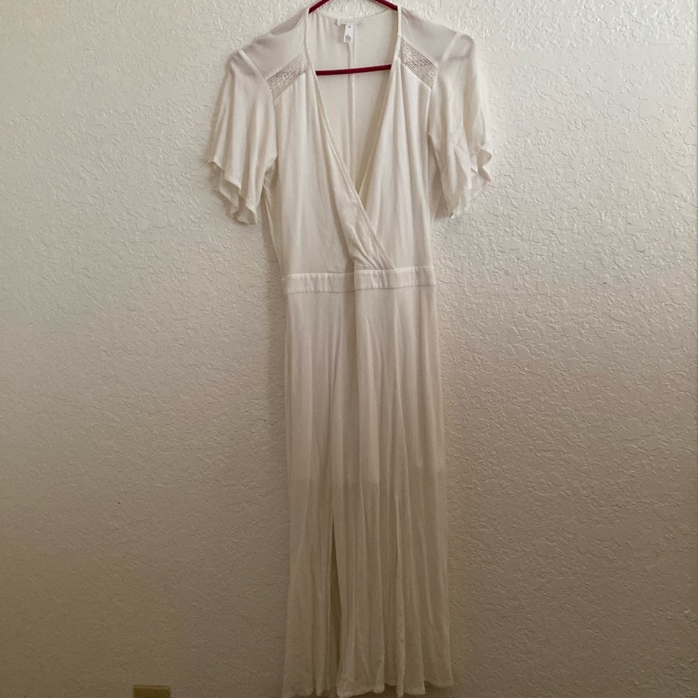 Woman’s dress, size XS,material rayon and polyester, cream